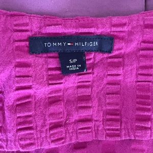 TH fun fuchsia dress with hidden buttons and tie at waist.